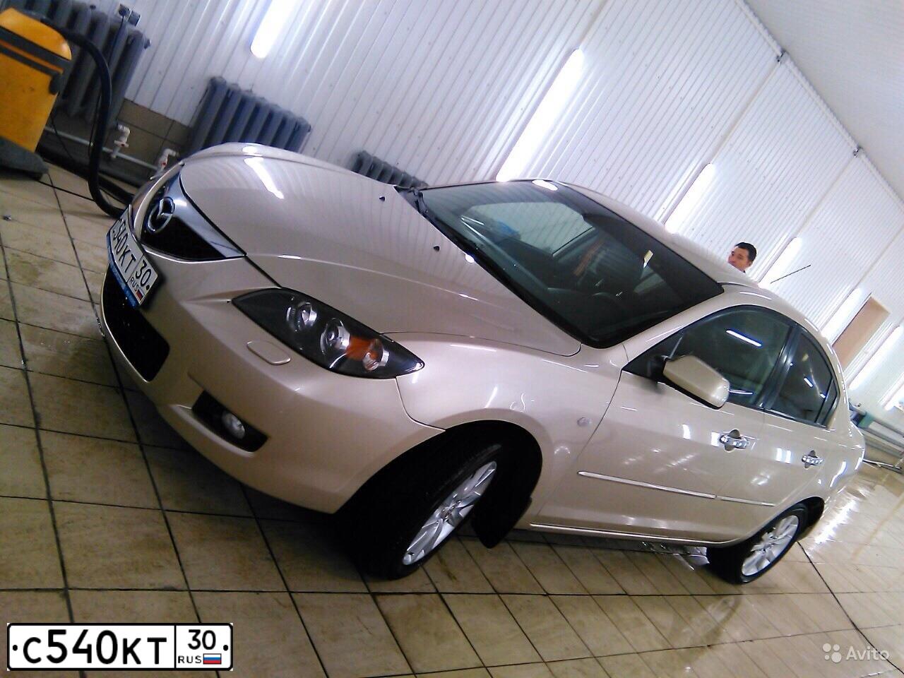 Фото автомобиля MAZDA 3, 2006 — госномер С540КТ30. Цвет: СЕРО-ЗОЛОТИСТЫЙ