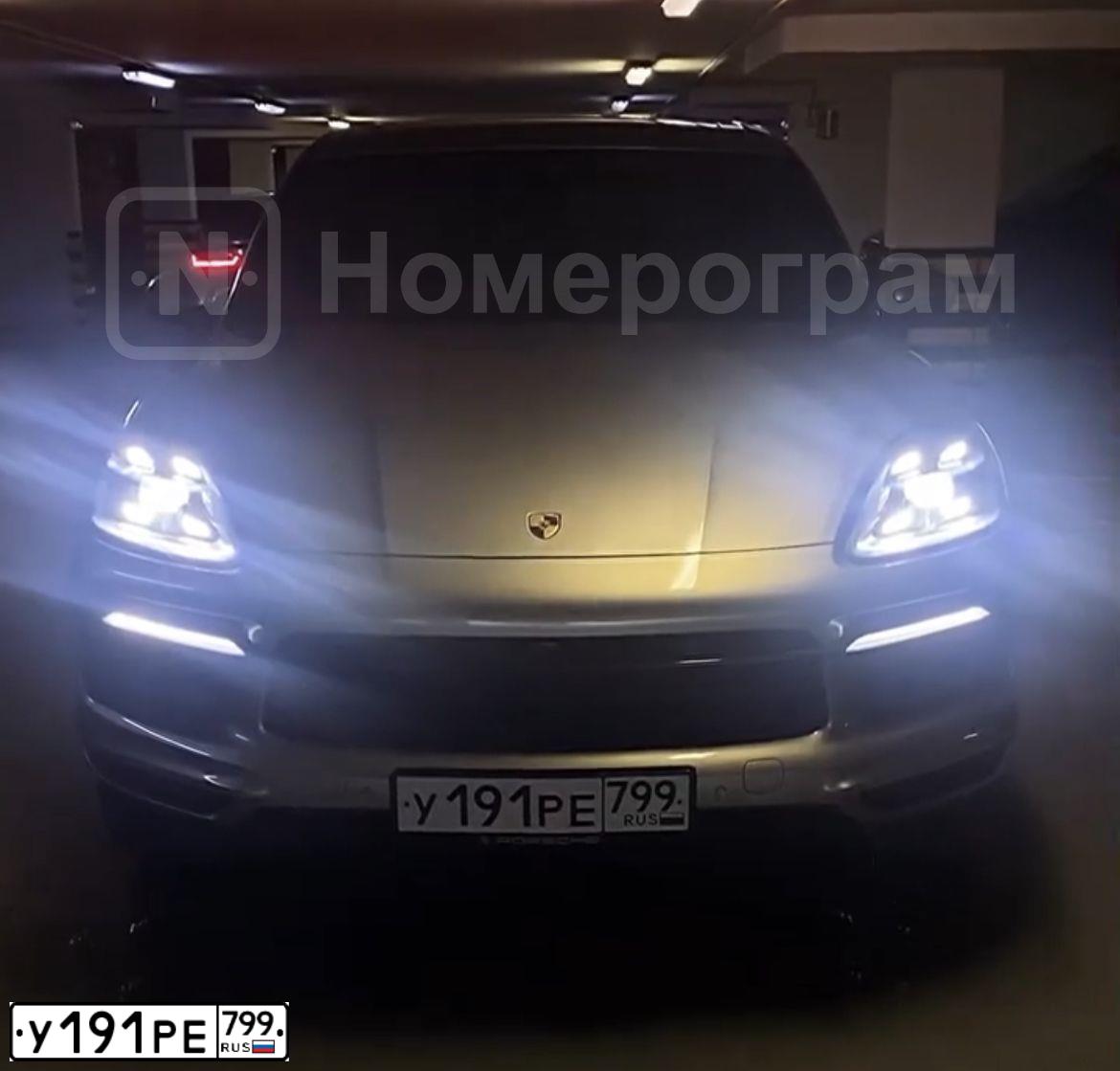 Фото автомобиля PORSCHE CAYENNE, 2019 — госномер У191РЕ799. Цвет: Коричневый