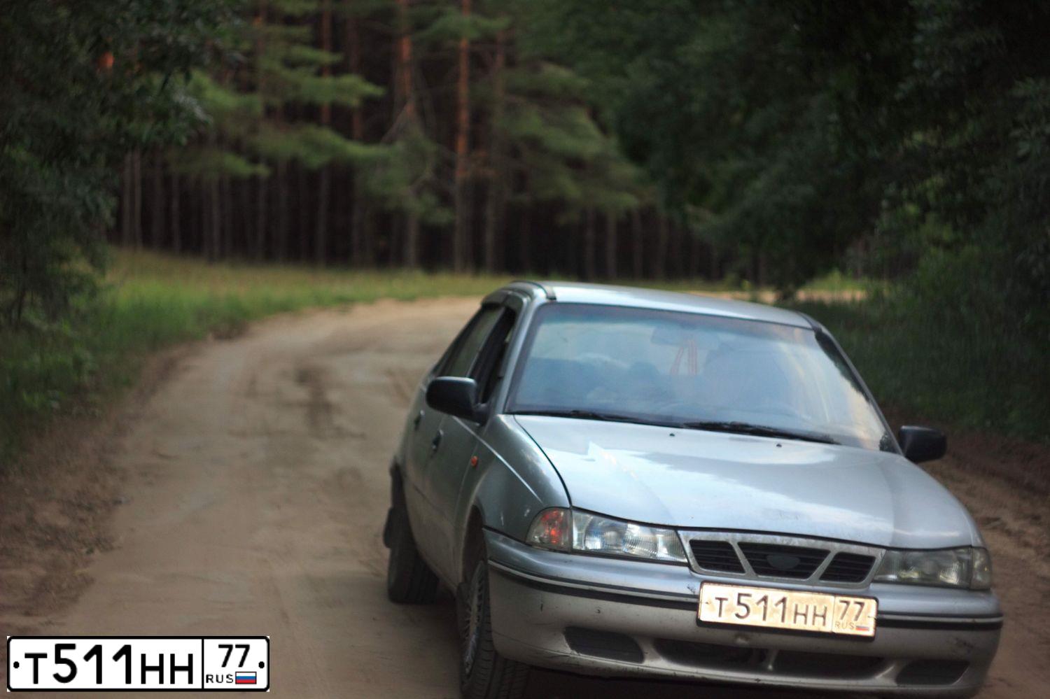 Фото автомобиля DAEWOO NEXIA, 2004 — госномер Т511НН77. Цвет: СЕРЫЙ