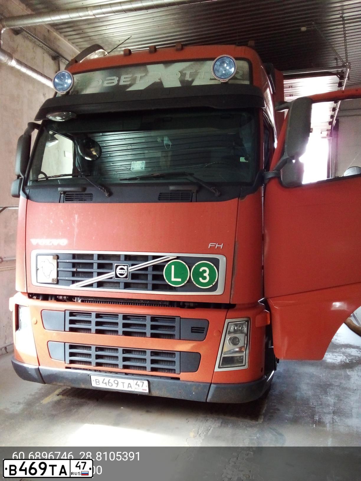 Фото автомобиля VOLVO SERIE FH /6X2/, 2006 — госномер В469ТА47. Цвет: ОРАНЖЕВЫЙ