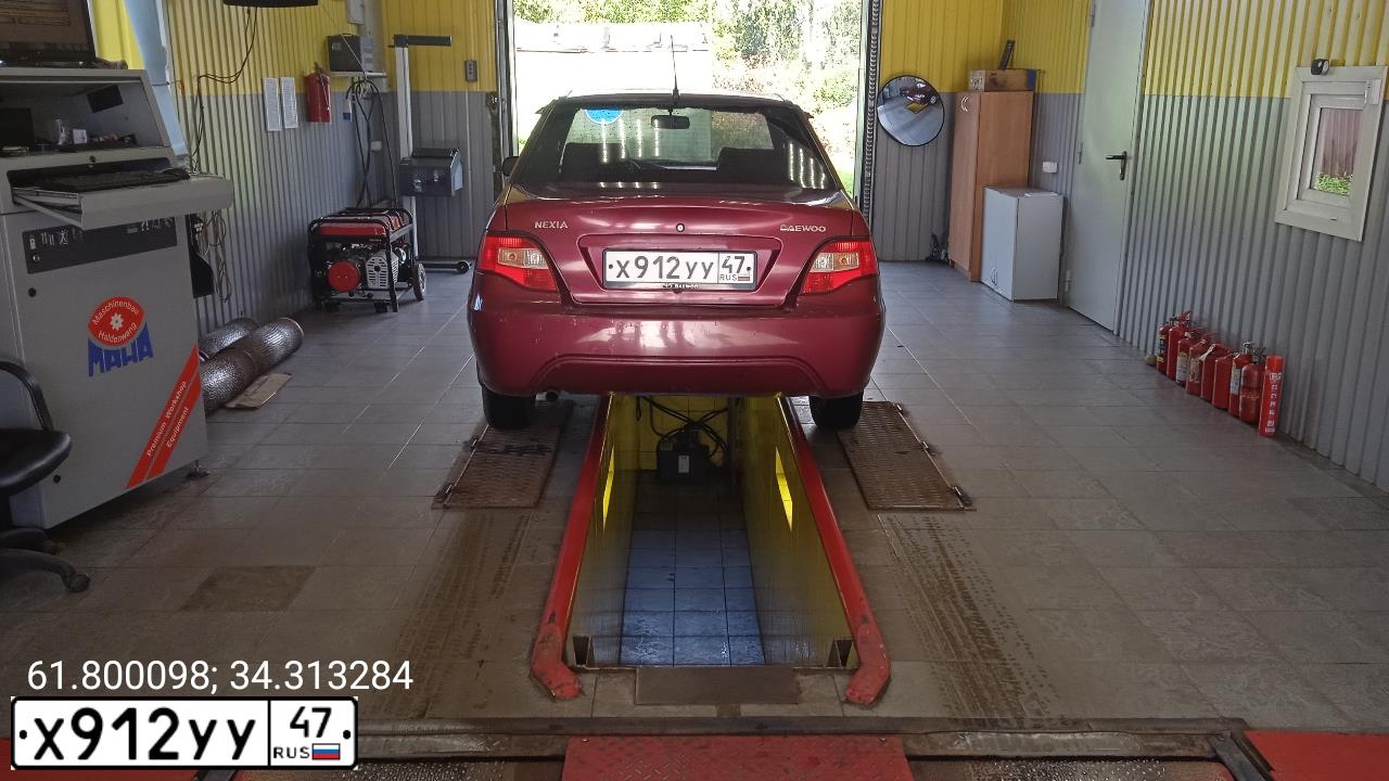 Фото автомобиля DAEWOO NEXIA, 2009 — госномер Н358МО10. Цвет: СПЕЛАЯ ВИШНЯ