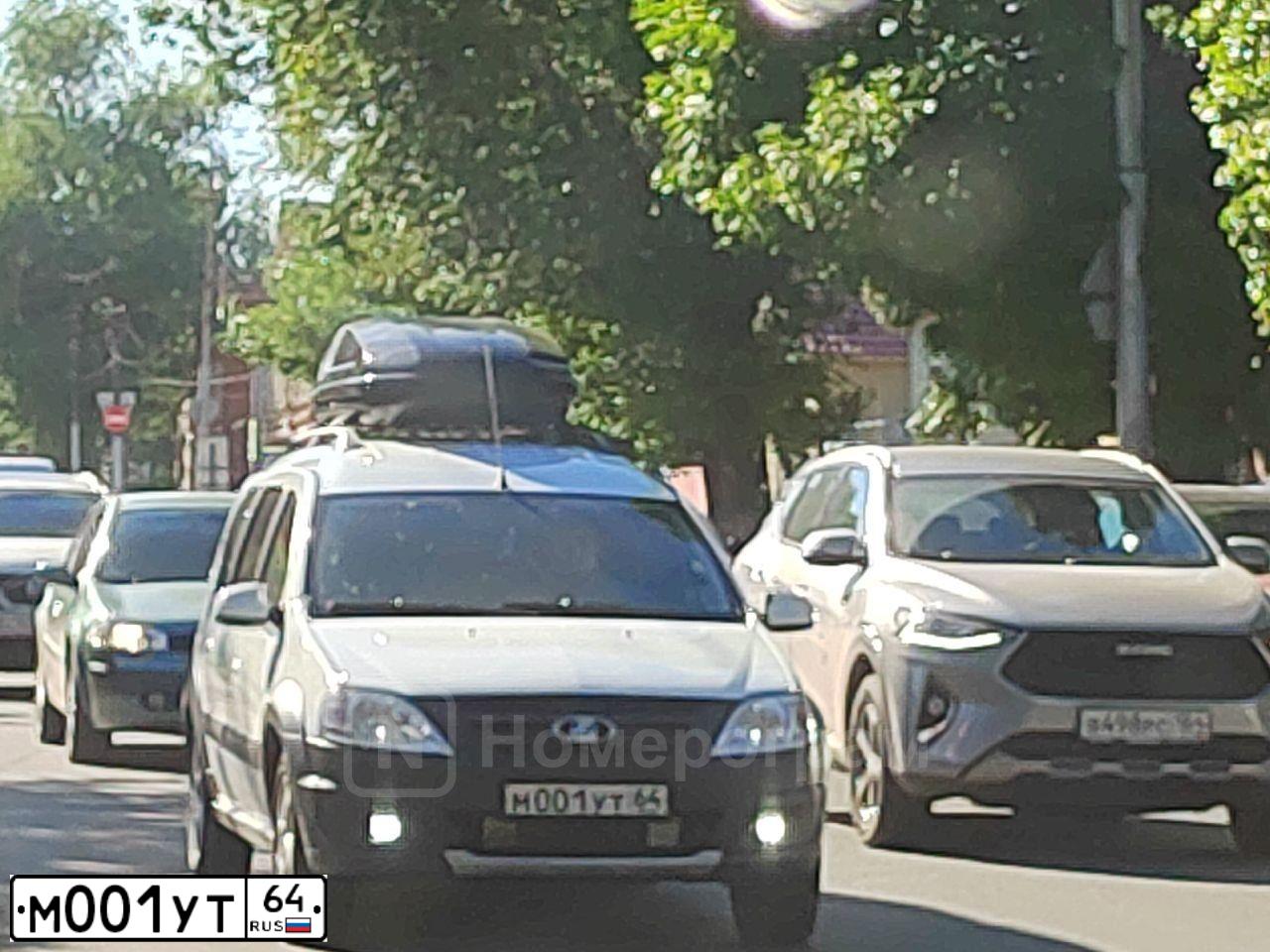 Фото автомобиля LADA LARGUS, 2019 — госномер Е179МК164. Цвет: Белый