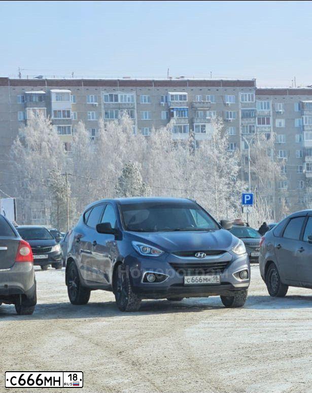 Фото автомобиля SUZUKI /GRAND/ VITARA, 2006 — госномер Х009ЕР18. Цвет: синий