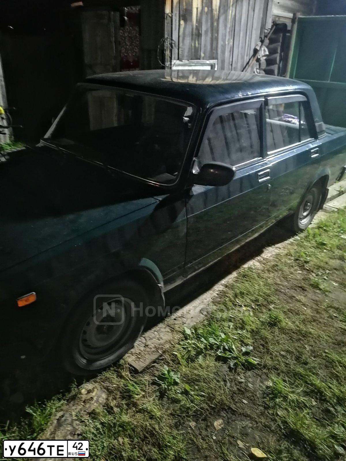 Фото автомобиля LADA 2107, 2008 — госномер Р156СР70. Цвет: ТЕМНО-ЗЕЛЕНЫЙ