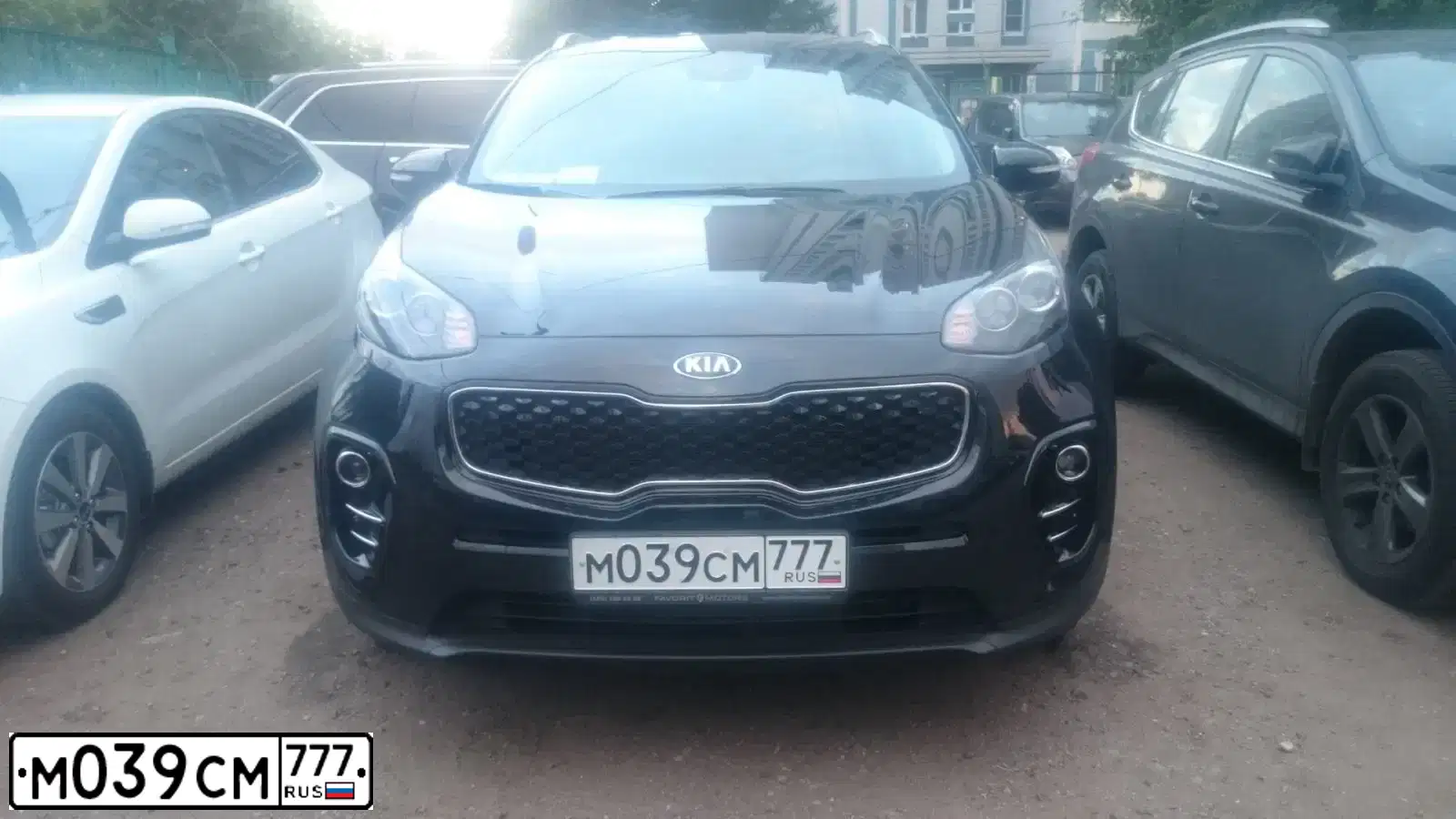 Фото автомобиля KIA SPORTAGE, 2016 — госномер М039СМ777. Цвет: ЧЕРНЫЙ ПЕРЛАМУТР