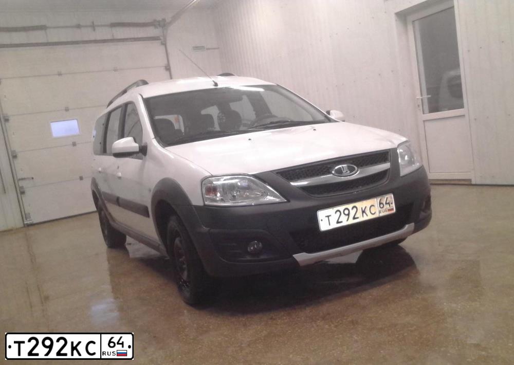 Фото автомобиля LADA LARGUS, 2014 — госномер Т635УА64. Цвет: БЕЛЫЙ