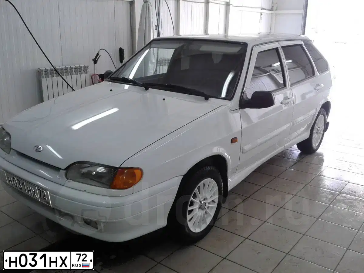 Фото автомобиля LADA 2114 SAMARA, 2011 — госномер Н031НХ72. Цвет: Белый