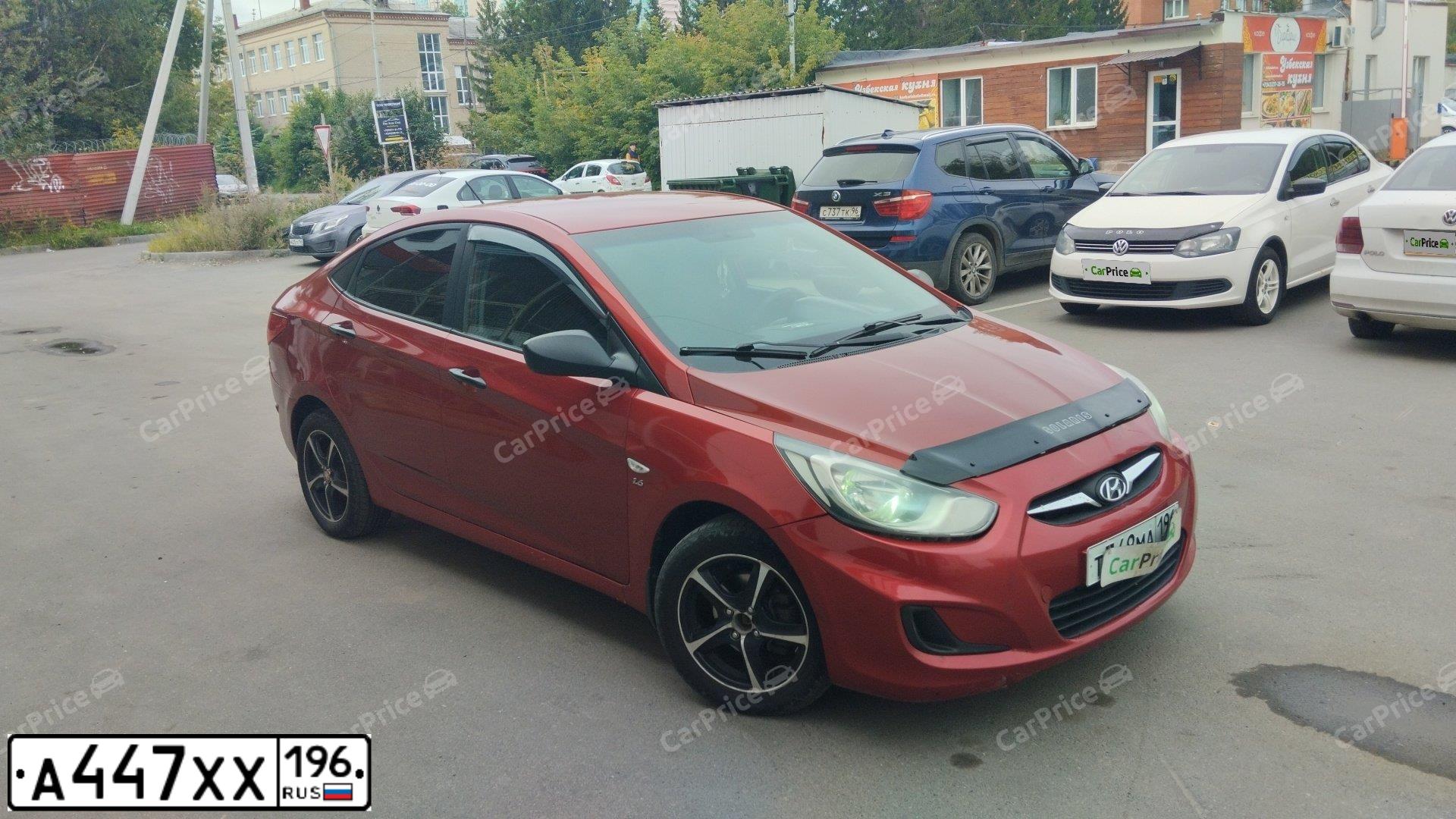 Фото автомобиля HYUNDAI SOLARIS, 2014 — госномер О549УМ196. Цвет: КРАСНЫЙ ГРАНАТ