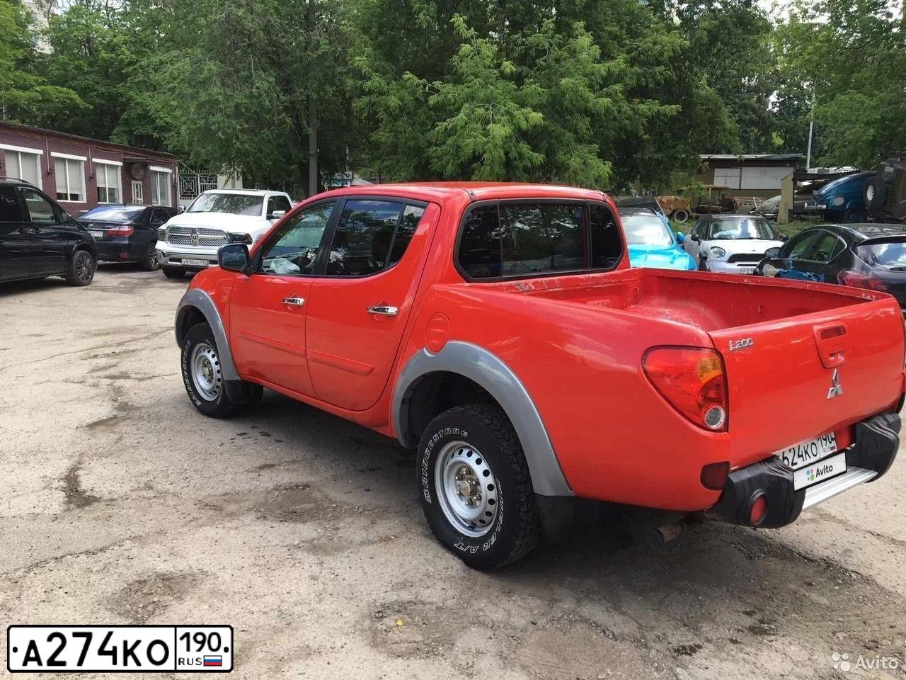 Фото автомобиля RENAULT LOGAN, 2010 — госномер А274КО190. Цвет: КРАСНЫЙ