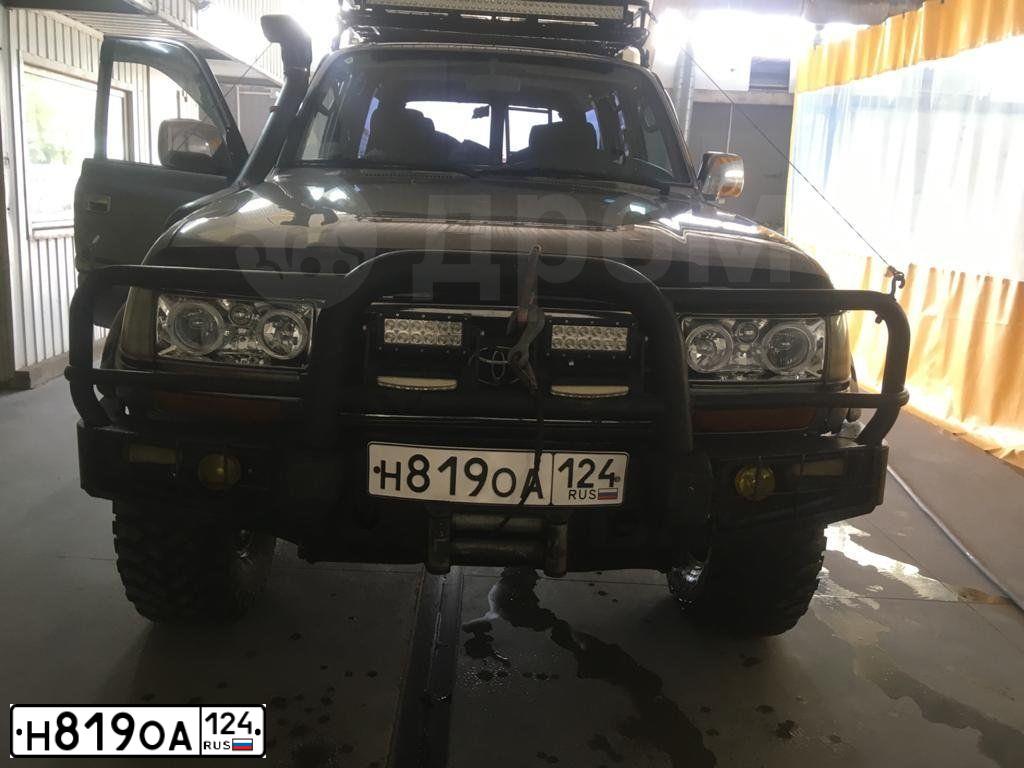 Фото автомобиля TOYOTA LAND CRUISER, 1997 — госномер К907НТ14. Цвет: СЕРЫЙ