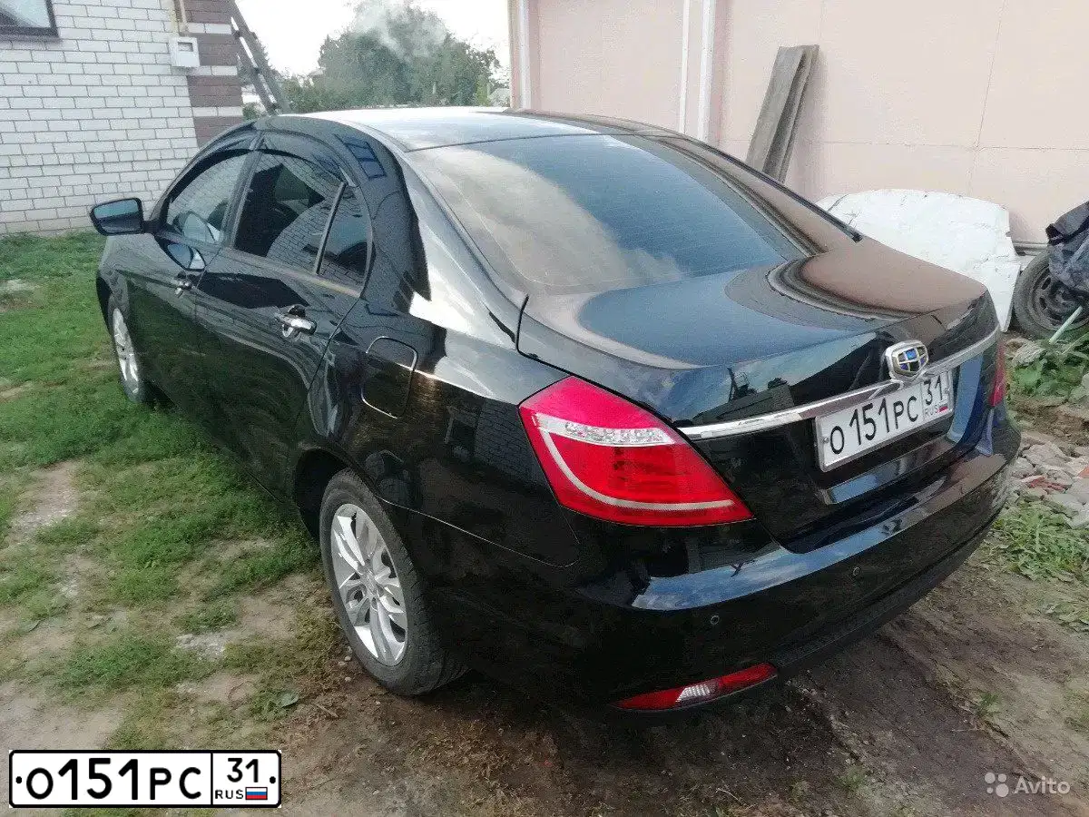 Фото автомобиля GEELY EMGRAND, 2016 — госномер Х163ХТ43. Цвет: ЧЕРНЫЙ