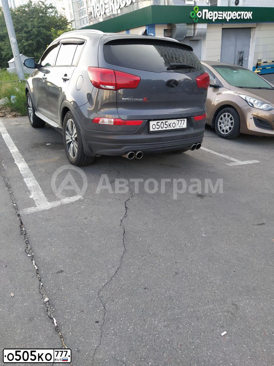 Фото автомобиля KIA SPORTAGE, 2014 — госномер О505КО777. Цвет: Серый