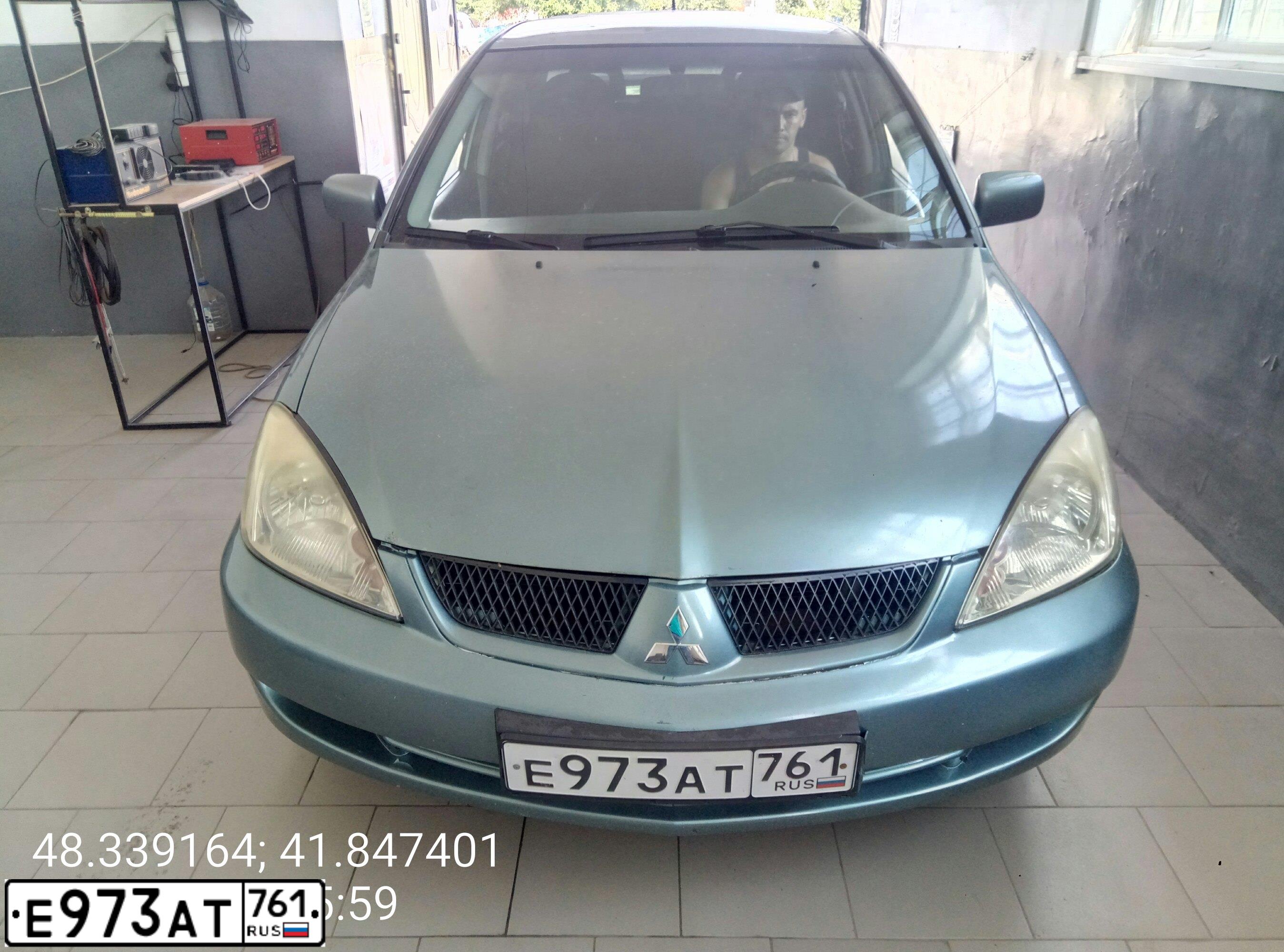 Фото автомобиля MITSUBISHI LANCER, 2006 — госномер В804ЕХ134. Цвет: светло-серый-зеленый