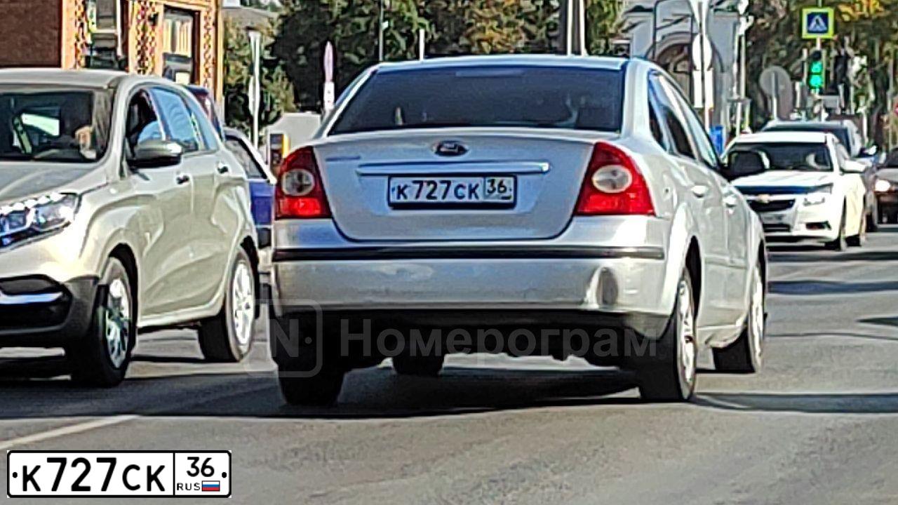 Фото автомобиля FORD FOCUS, 2007 — госномер К727СК36. Цвет: Серебристый