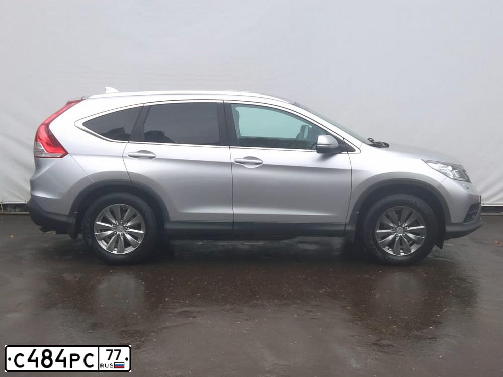 Фото автомобиля HONDA CR-V, 2013 — госномер С484РС77. Цвет: Серебристый