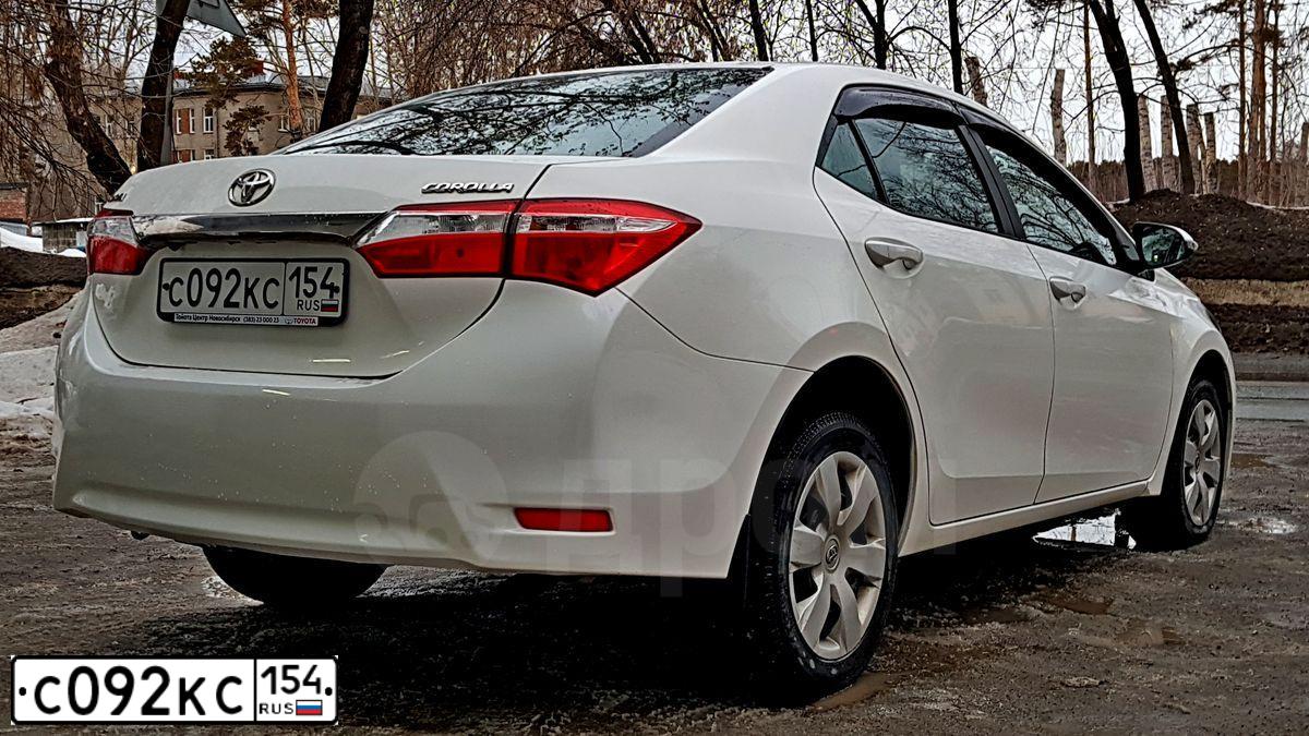 Фото автомобиля TOYOTA COROLLA, 2013 — госномер В584ВО17. Цвет: Белый