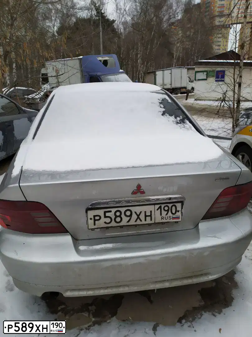 Фото автомобиля MITSUBISHI GALANT, 2001 — госномер Х895АУ31. Цвет: СЕРЕБРИСТЫЙ