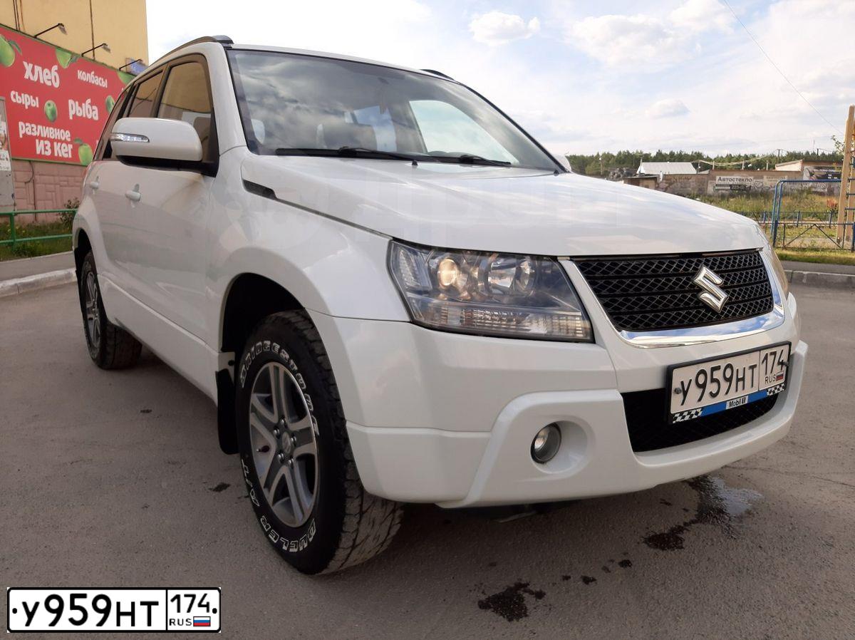 Фото автомобиля SUZUKI /GRAND/ VITARA, 2011 — госномер У959НТ174. Цвет: Белый