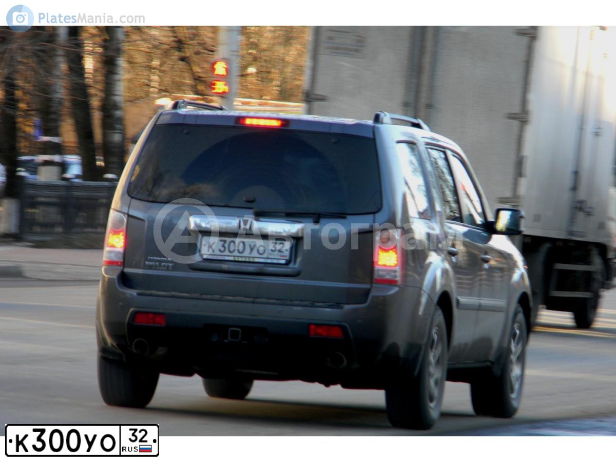 Фото автомобиля KIA SORENTO, 2019 — госномер К300УО32. Цвет: Серый