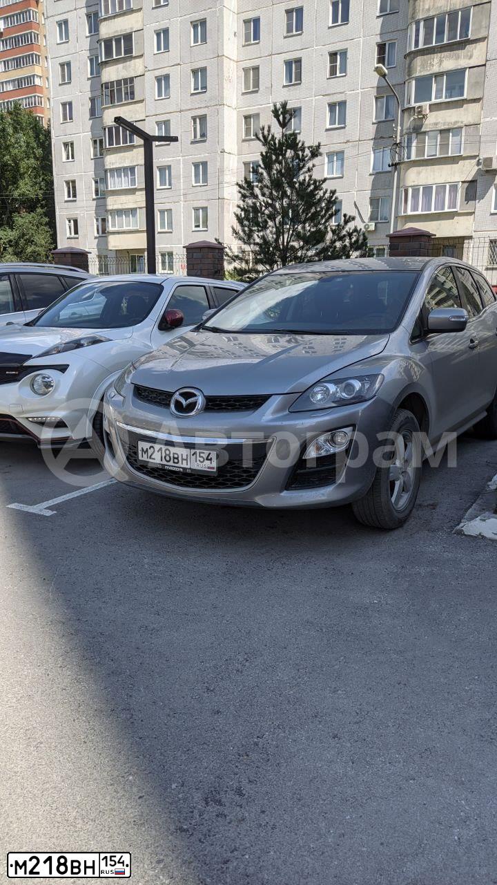 Фото автомобиля MAZDA CX-7, 2011 — госномер М218ВН154. Цвет: СЕРЕБРИСТЫЙ