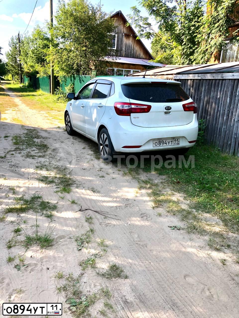 Фото автомобиля KIA RIO, 2014 — госномер О894УТ11. Цвет: Белый