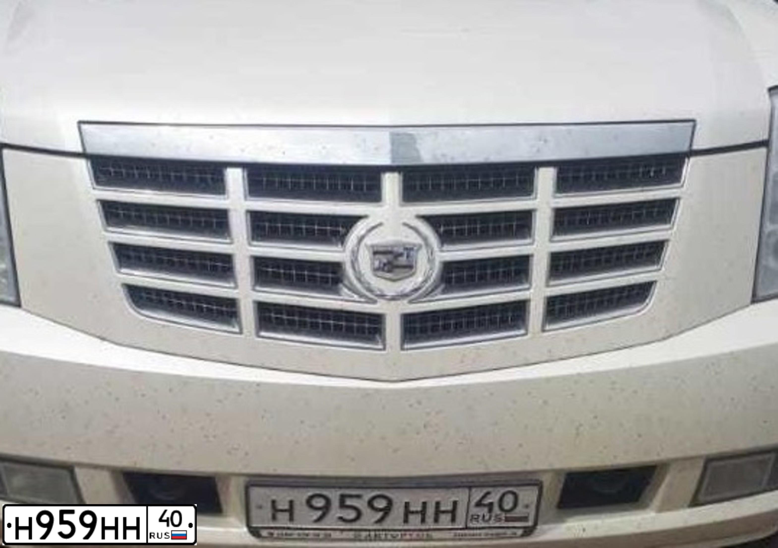 Фото автомобиля CADILLAC ESCALADE, 2010 — госномер У197ВС197. Цвет: Белый
