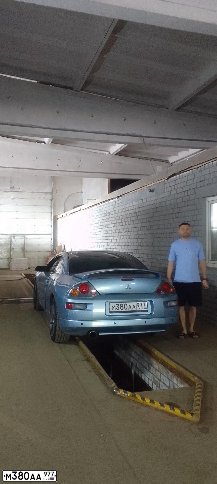 Фото автомобиля MITSUBISHI ECLIPSE, 2003 — госномер К557ТР69. Цвет: голубой