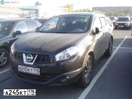 Фото автомобиля NISSAN QASHQAI, 2010 — госномер А245КТ178. Цвет: ФИОЛЕТОВЫЙ