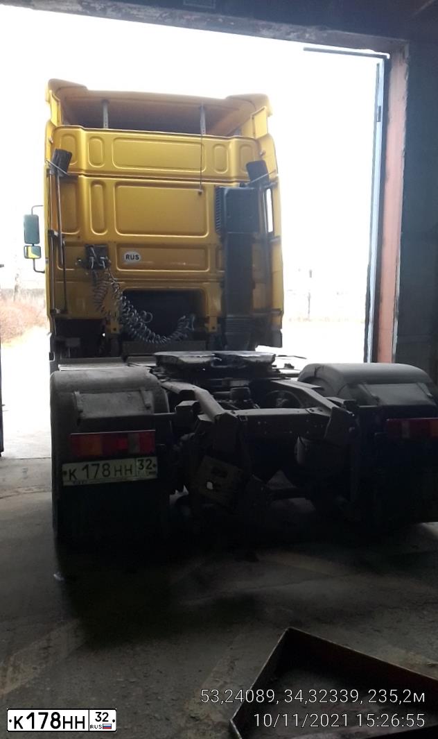 Фото автомобиля DAF XF 95 FT /4X2/, 2006 — госномер К178НН32. Цвет: ЖЕЛТЫЙ
