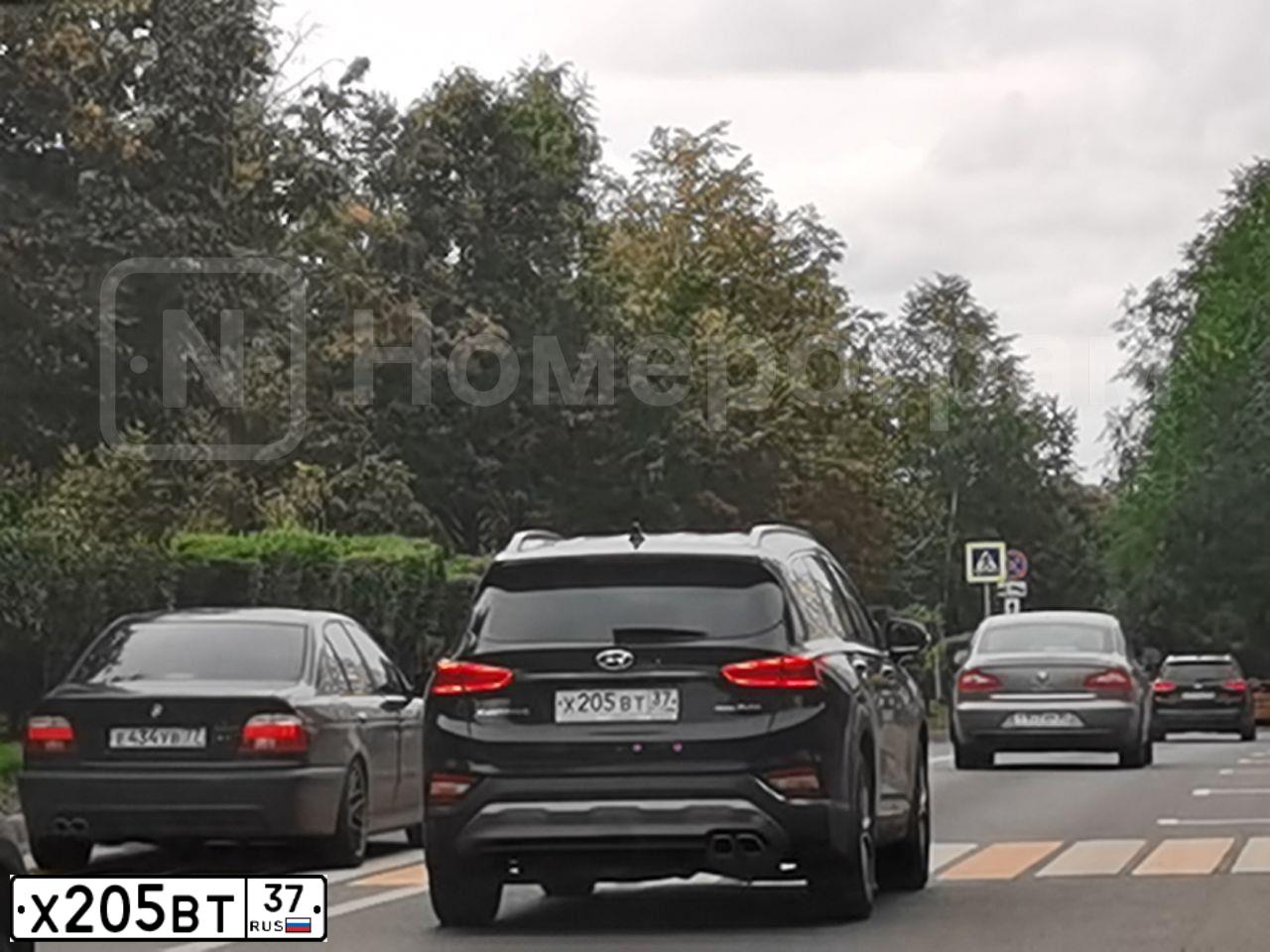 Фото автомобиля HYUNDAI SANTA FE, 2019 — госномер Х205ВТ37. Цвет: ЧЕРНЫЙ