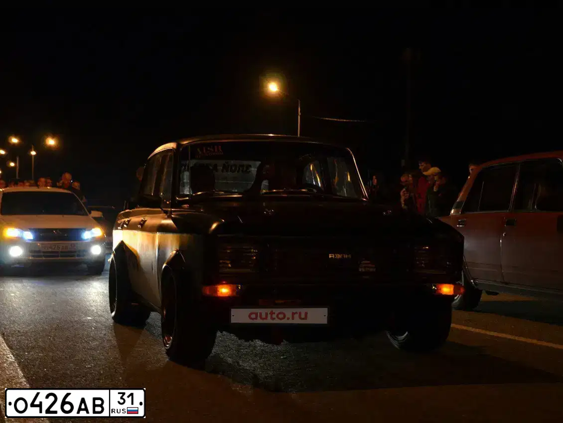 Фото автомобиля LADA 2190 GRANTA, 2014 — госномер Х369АР31. Цвет: Белый
