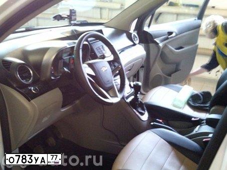 Фото автомобиля CHEVROLET ORLANDO, 2013 — госномер О783УА77. Цвет: Белый