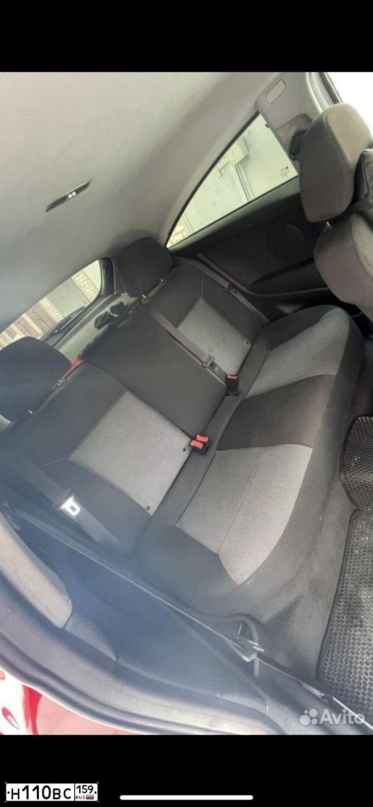 Фото автомобиля OPEL ASTRA, 2010 — госномер Н110ВС159. Цвет: КРАСНО-ЧЕРНЫЙ
