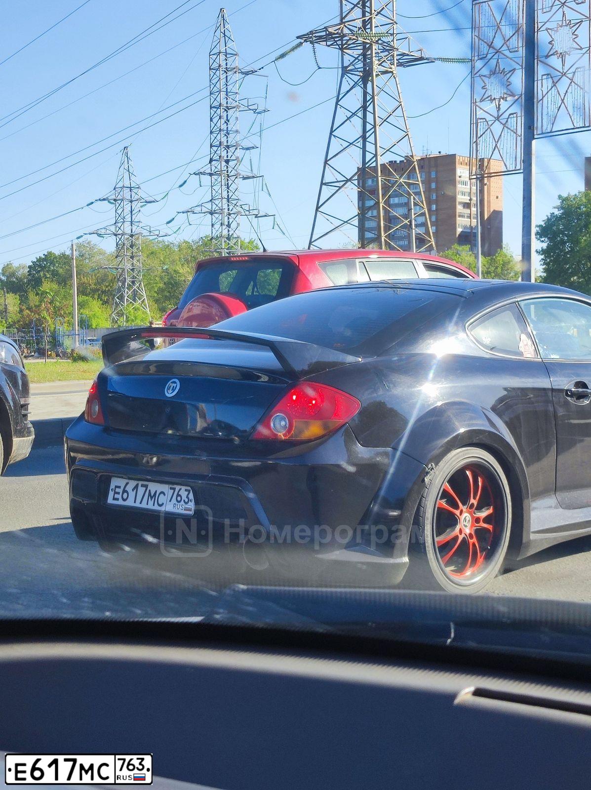 Фото автомобиля HYUNDAI /S-/COUPE / TUSCANI, 2003 — госномер Е617МС763. Цвет: ЧЕРНЫЙ