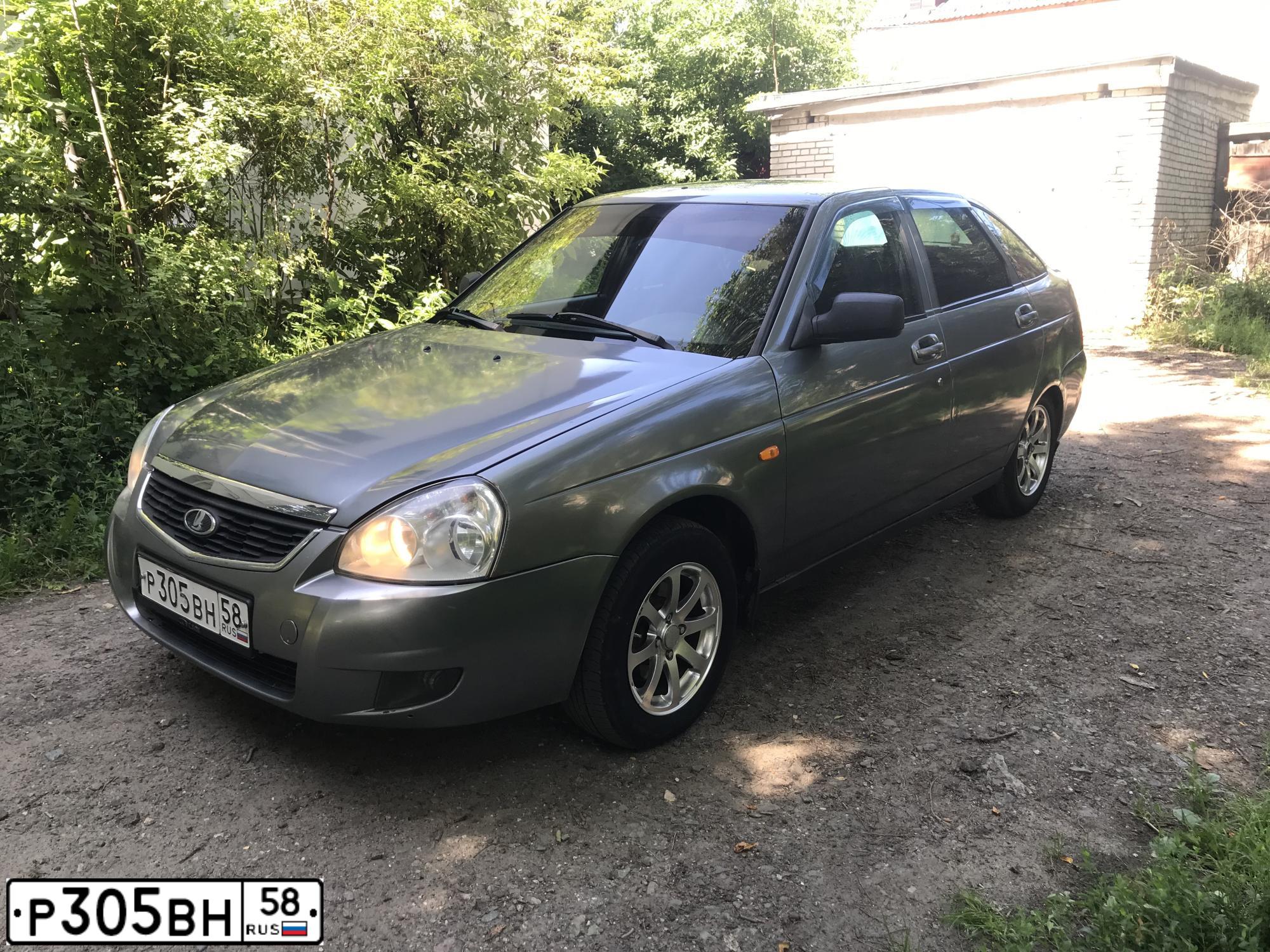 Фото автомобиля LADA 2172 PRIORA, 2011 — госномер Р305ВН58. Цвет: СРЕДНИЙ СЕРО-ЗЕЛЕНЫЙ МЕТ