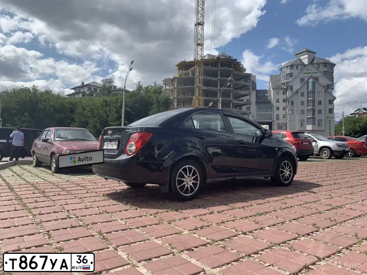 Фото автомобиля CHEVROLET T AVEO, 2012 — госномер Т867УА36. Цвет: ЧЕРНЫЙ