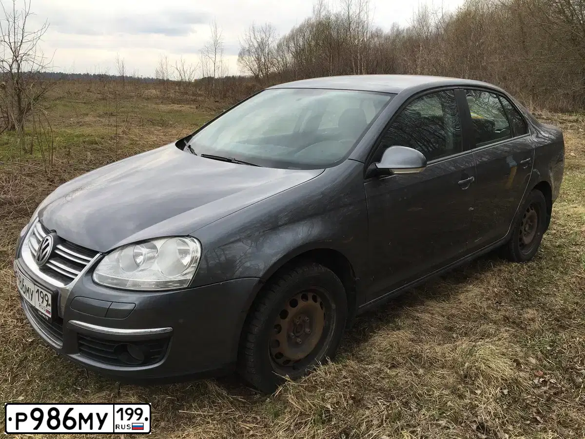 Фото автомобиля VOLKSWAGEN JETTA, 2008 — госномер М434РВ799. Цвет: ТЕМНО-СЕРЫЙ