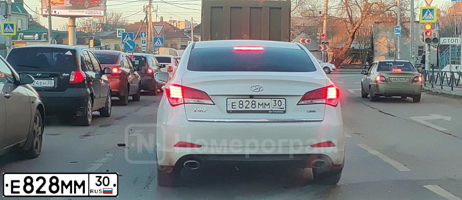 Фото автомобиля HYUNDAI I40, 2014 — госномер Е828ММ30. Цвет: Белый