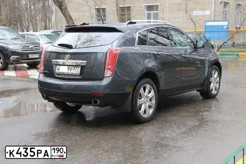 Фото автомобиля TOYOTA HIGHLANDER, 2011 — госномер Х012ОТ124. Цвет: ЧЕРНЫЙ