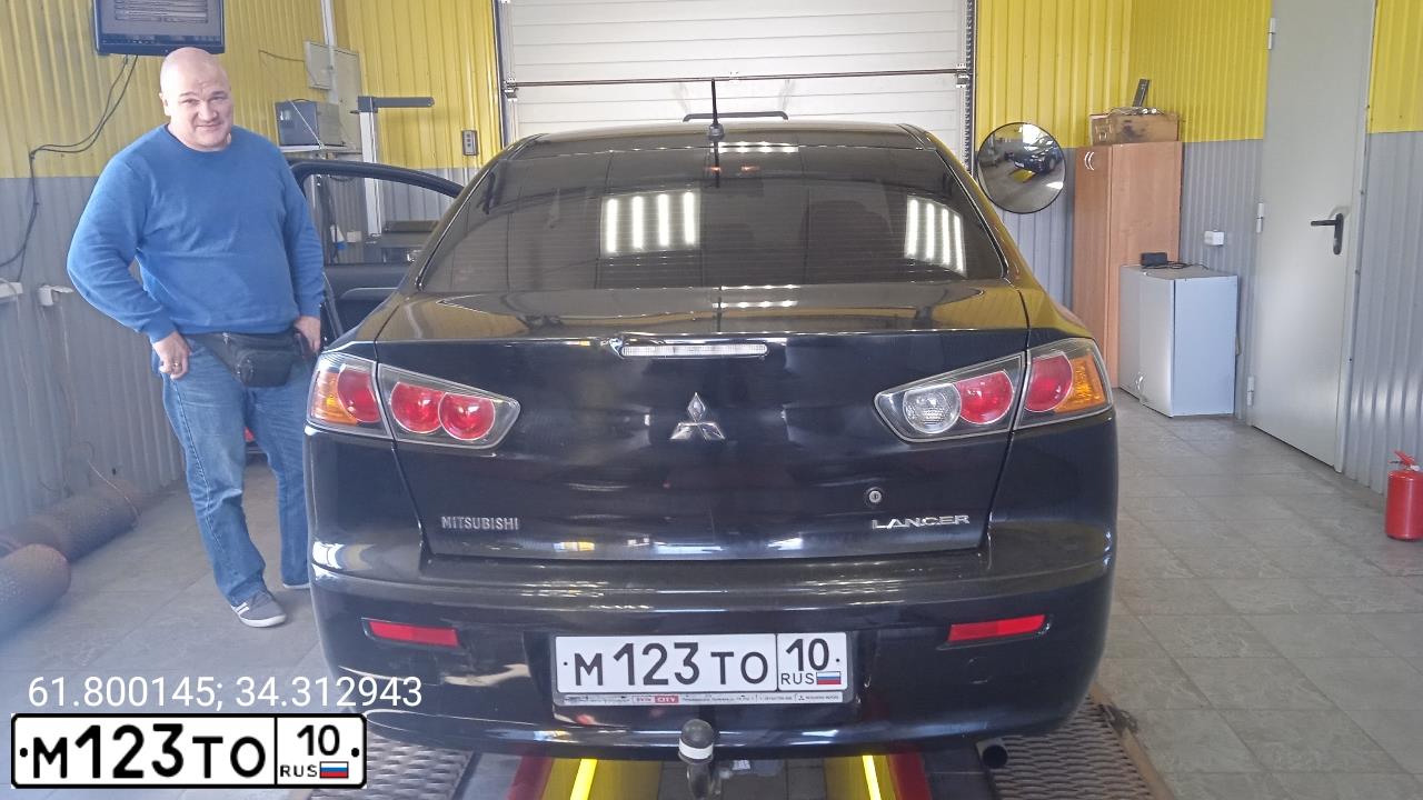 Фото автомобиля MITSUBISHI LANCER, 2010 — госномер М123ТО10