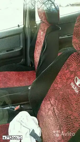 Фото автомобиля DAEWOO NEXIA, 2010 — госномер О588НС71. Цвет: СПЕЛАЯ ВИШНЯ