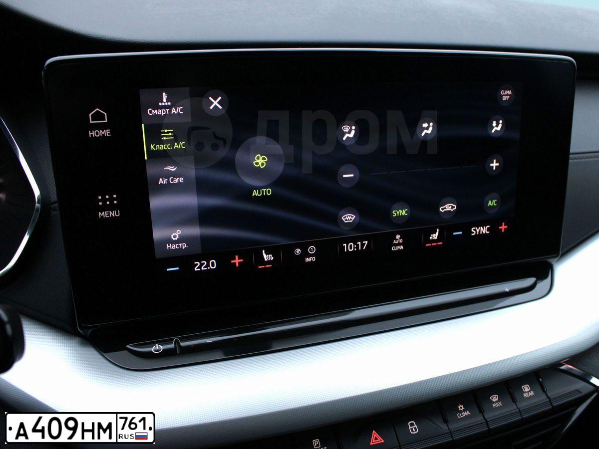 Фото автомобиля SKODA OCTAVIA, 2022 — госномер Е119ЕУ180. Цвет: ЧЕРНЫЙ