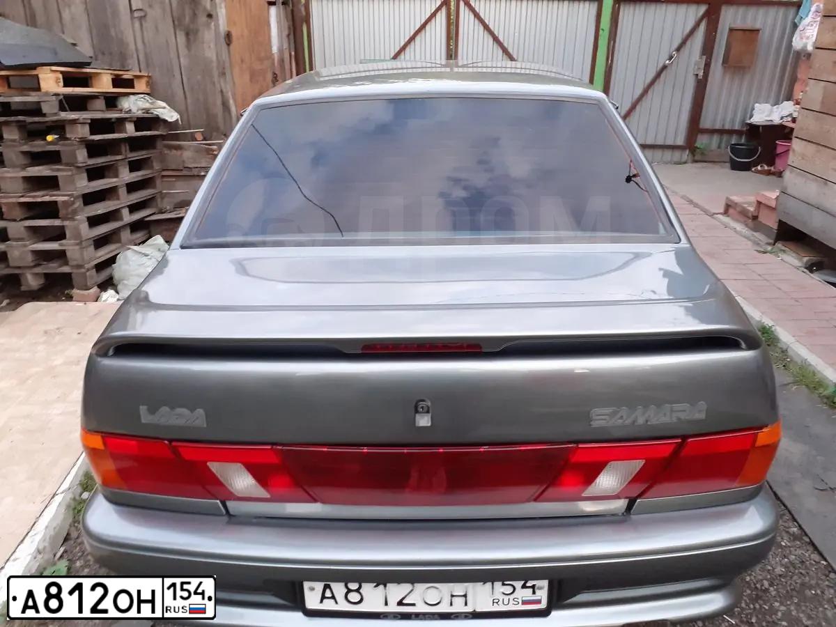 Фото автомобиля LADA 2115 SAMARA, 2011 — госномер Е653НО186. Цвет: СРЕДНИЙ СЕРО ЗЕЛЕНЫЙ МЕТА
