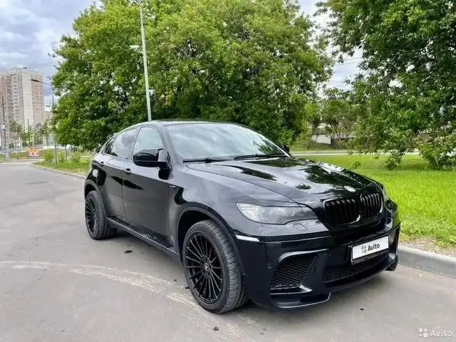 Фото автомобиля BMW X6, 2009 — госномер К001АК21. Цвет: ЧЕРНЫЙ