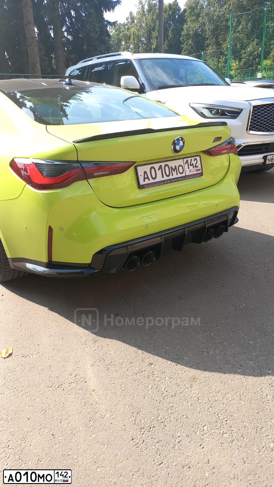 Фото автомобиля BMW M4, 2022 — госномер Р499КО774. Цвет: ЖЕЛТЫЙ