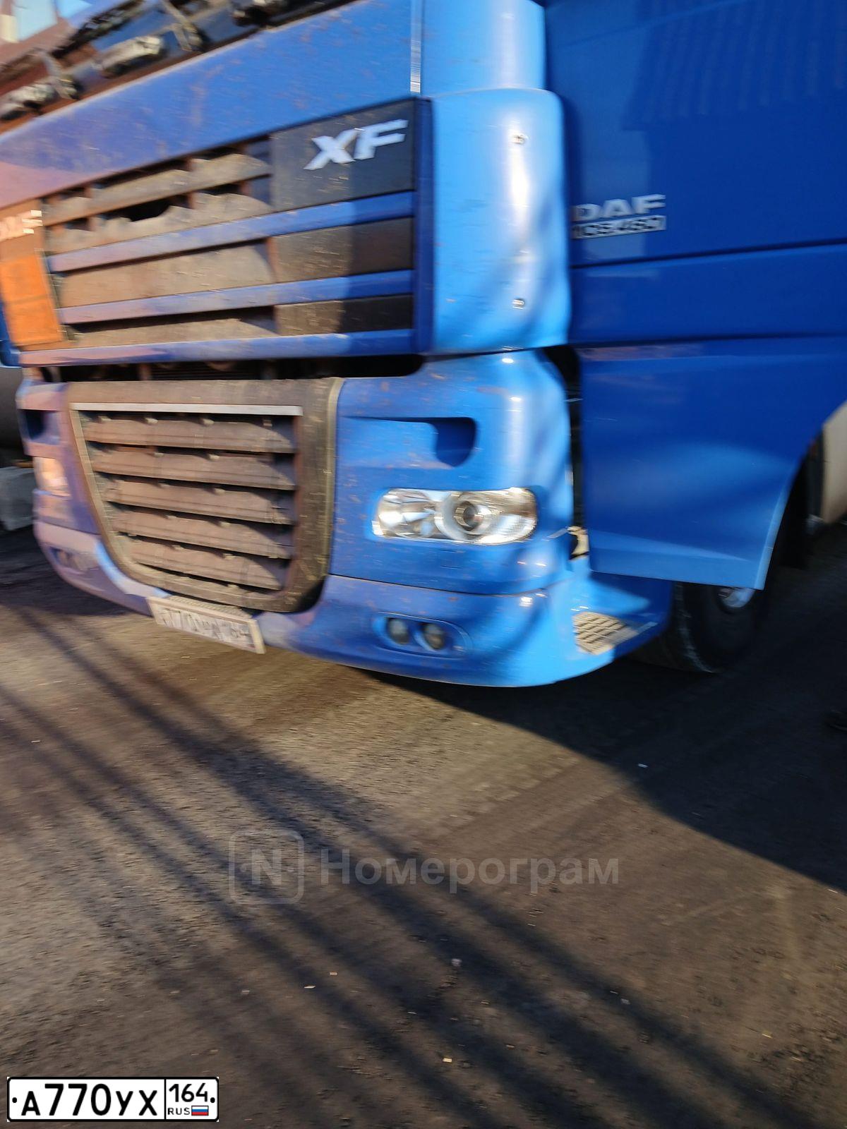 Фото автомобиля DAF F XF 105 FT 4X2, 2011 — госномер А770УХ164. Цвет: синий