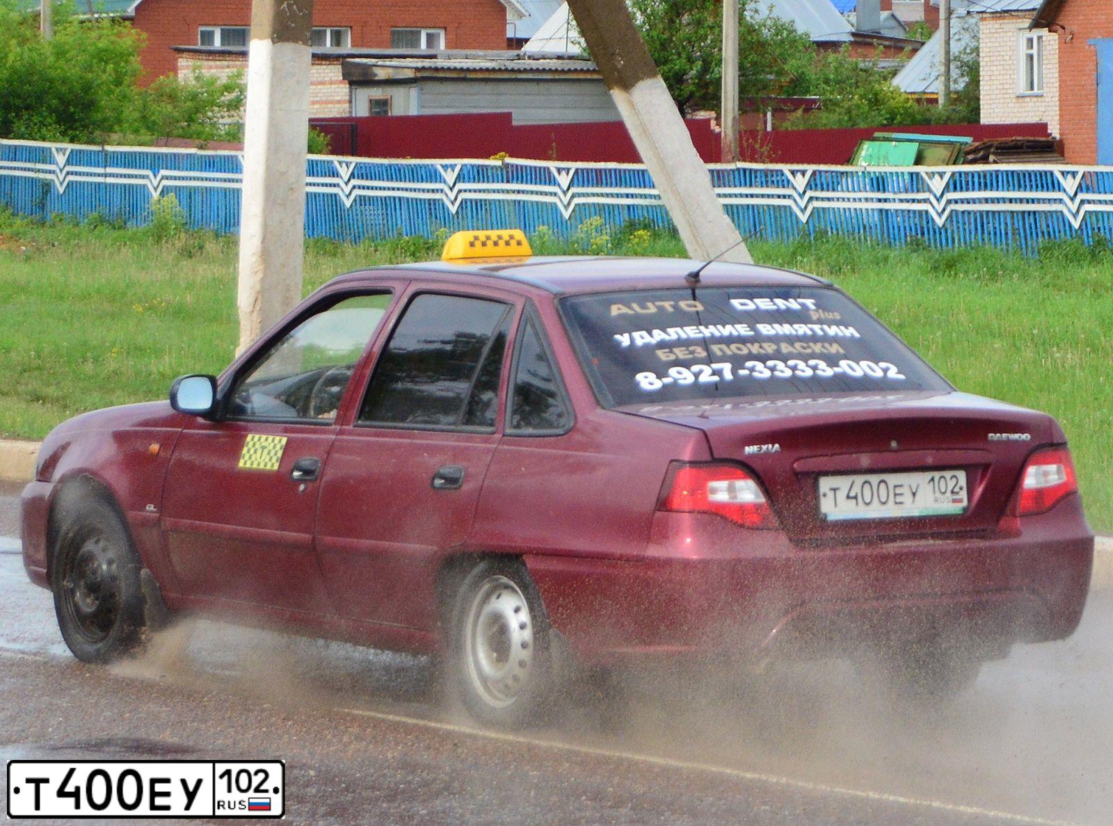Фото автомобиля LADA 1119 KALINA, 2009 — госномер В212КТ702. Цвет: Темный Сине-Фиолетовый