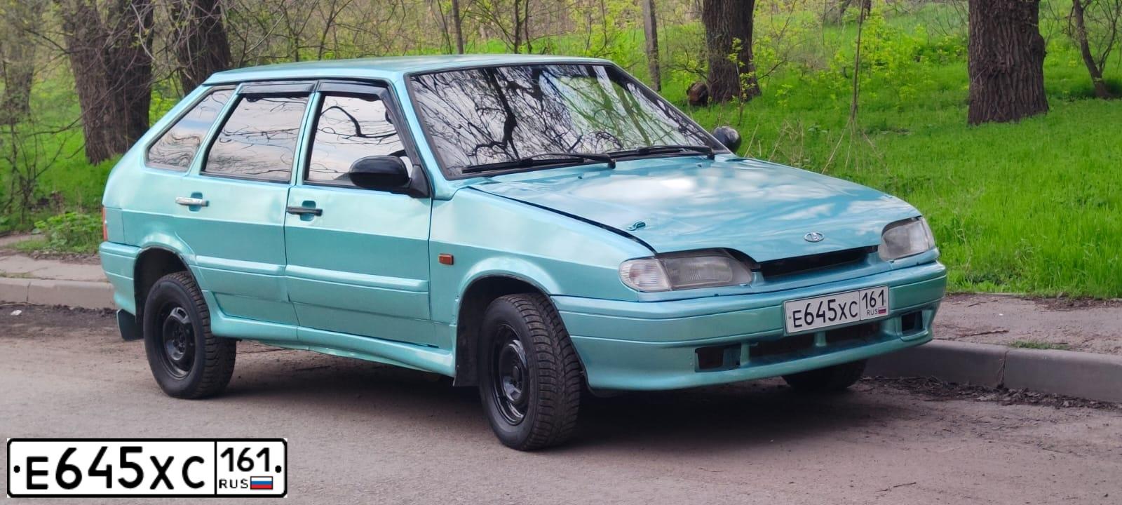 Фото автомобиля LADA 2114 SAMARA, 2006 — госномер Е645ХС161. Цвет: БЕЛО-ЗЕЛЕНЫЙ
