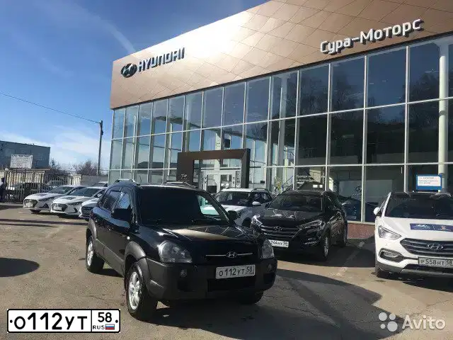Фото автомобиля HYUNDAI TUCSON, 2006 — госномер О112УТ58. Цвет: ЧЕРНЫЙ