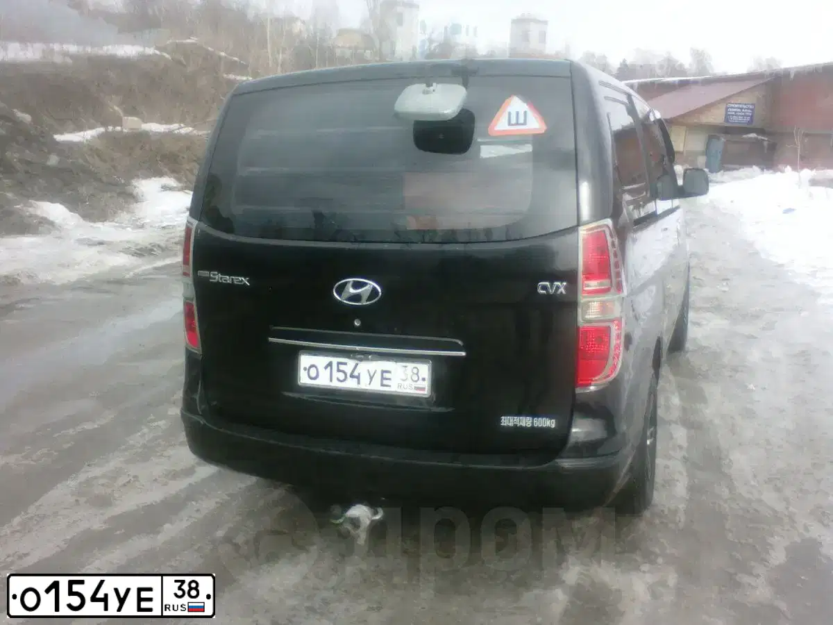 Фото автомобиля HYUNDAI GRAND STAREX, 2009 — госномер Н269ВУ154. Цвет: ЧЕРНЫЙ